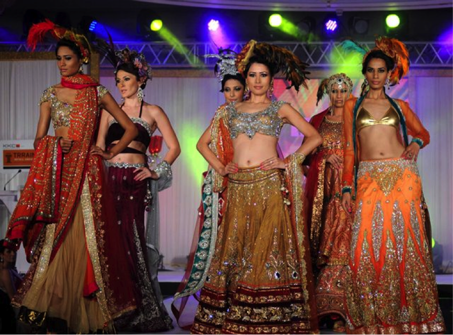  fashion show gold borders hindu weddings lehenga red bridal 